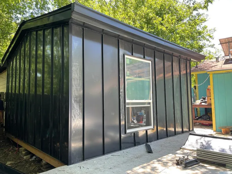 Black standing seam metal wall panels for Metal Roof Installation in Bemiss