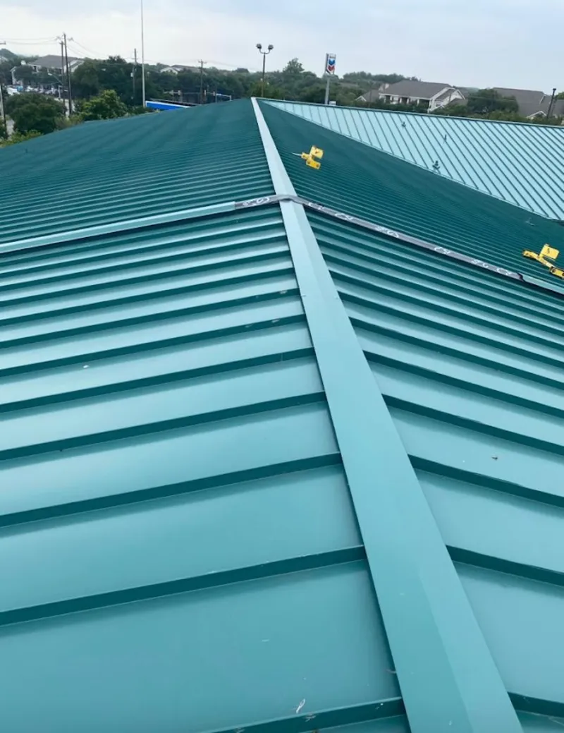 Green commercial metal roof ridge and valley for Metal Roof Repair in Bemiss
